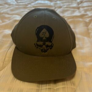 Zero Foxtrot Green and Black Curved Brim Hats with Embroidered Designs